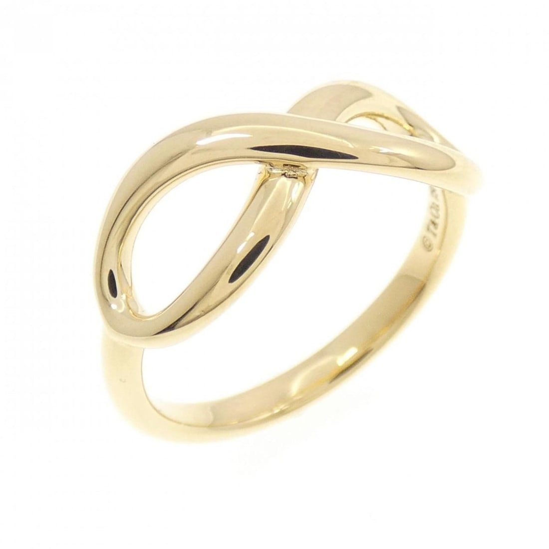 Tiffany Infinity Ring: --- Catalog ---Category: SizeJP Size: 9.0US Size: 5Category: DesignType: Band ringGender: WomenMaterial: Yellow gold (18K)Category: GeneralBrand: Tiffany--- Item List ---Section: ConditionRanking: Ran