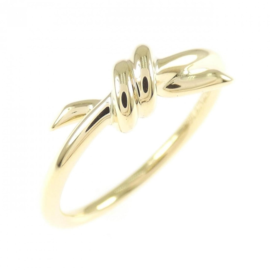 Tiffany Knot Ring: --- Catalog ---Category: SizeJP Size: 11.0US Size: 6Category: DesignType: Band ringGender: WomenMaterial: Yellow gold (18K)Category: GeneralBrand: Tiffany--- Item List ---Section: ConditionRanking: Ra