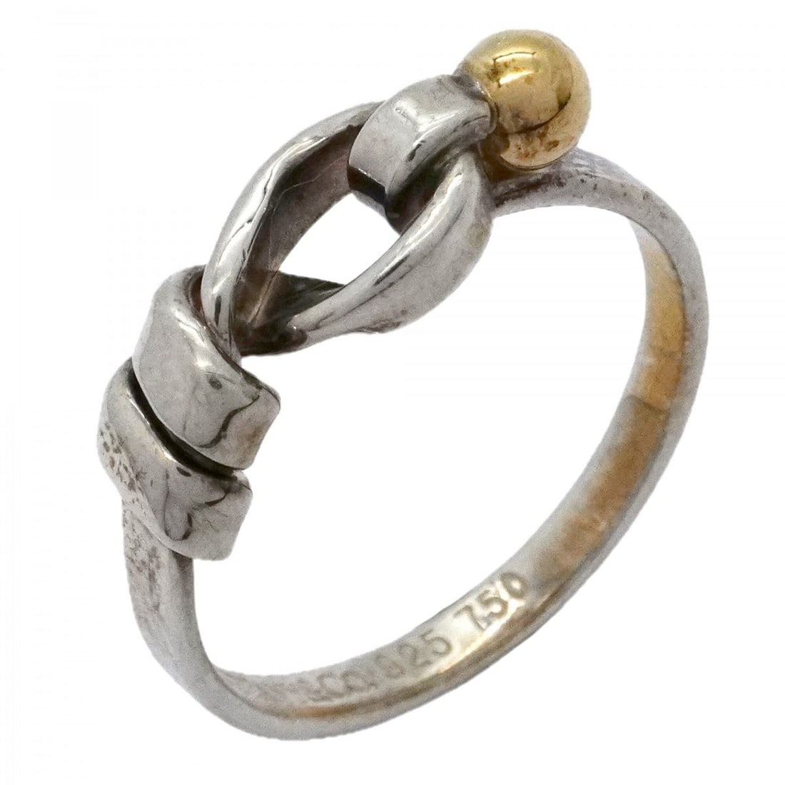 Tiffany & Co. Hook Eye Ring, 18K Yellow Gold (KYG), Sterling Silver 925, Size 15.5 (Men's/Women's): --- Catalog ---Category: SizeJP Size: 15.5US Size: 7.5Category: DesignType: Band ringGender: Men,WomenMaterial: Silver 925, Yellow gold (18K)Category: GeneralBrand: Tiffany--- Item List ---Section: Co