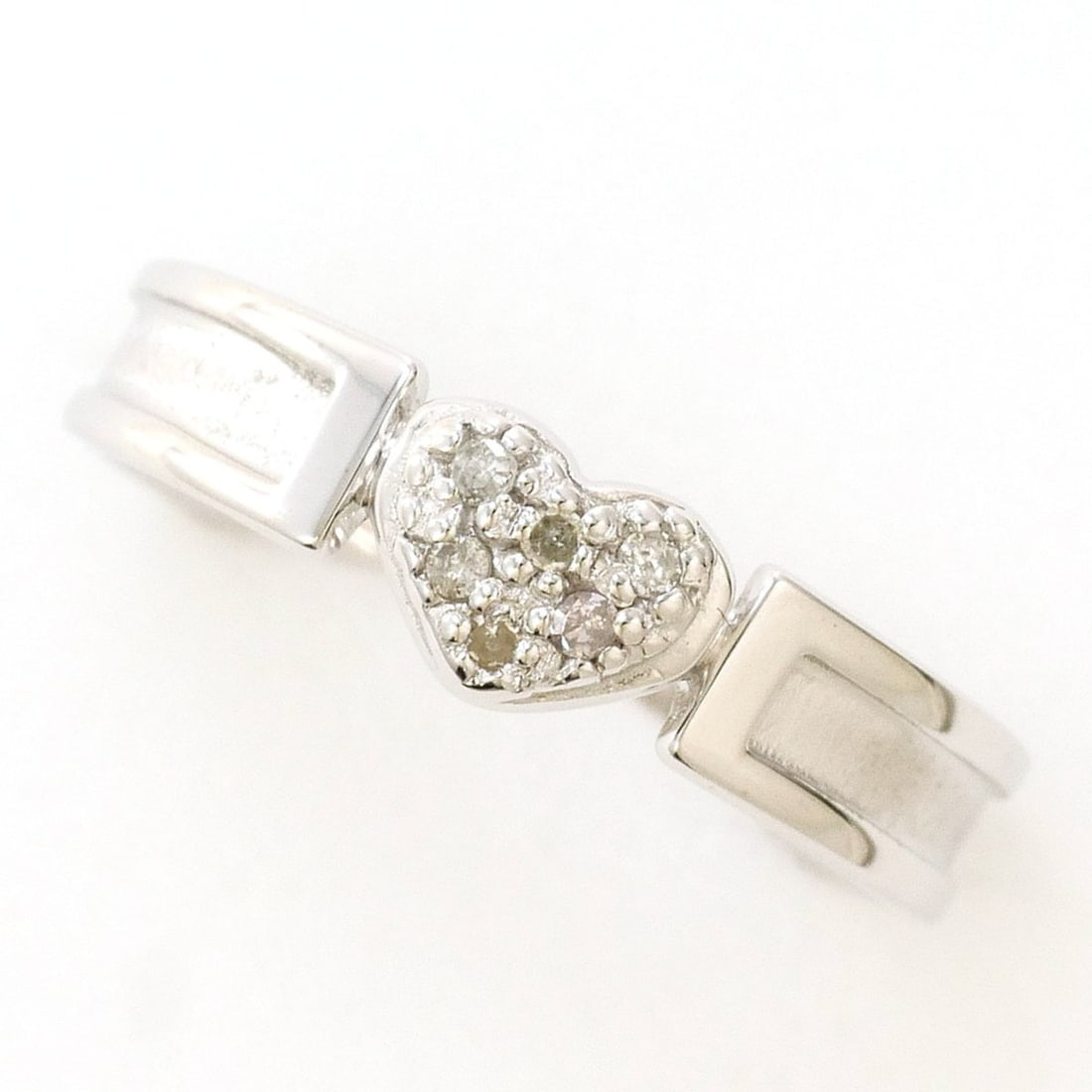 K10 10K WG White Gold Ring with Diamond (No carat marking), Total Weight 1.5g, Like New Condition.: --- Catalog ---Category: SizeWidth: 4mm / 0.16''Weight: 1.5g / 0.05oz.JP Size: 5US Size: 3.5Category: DesignType: Band ringColor: White goldMetal: White GoldStone: DiamondGender: WomenMaterial: White 