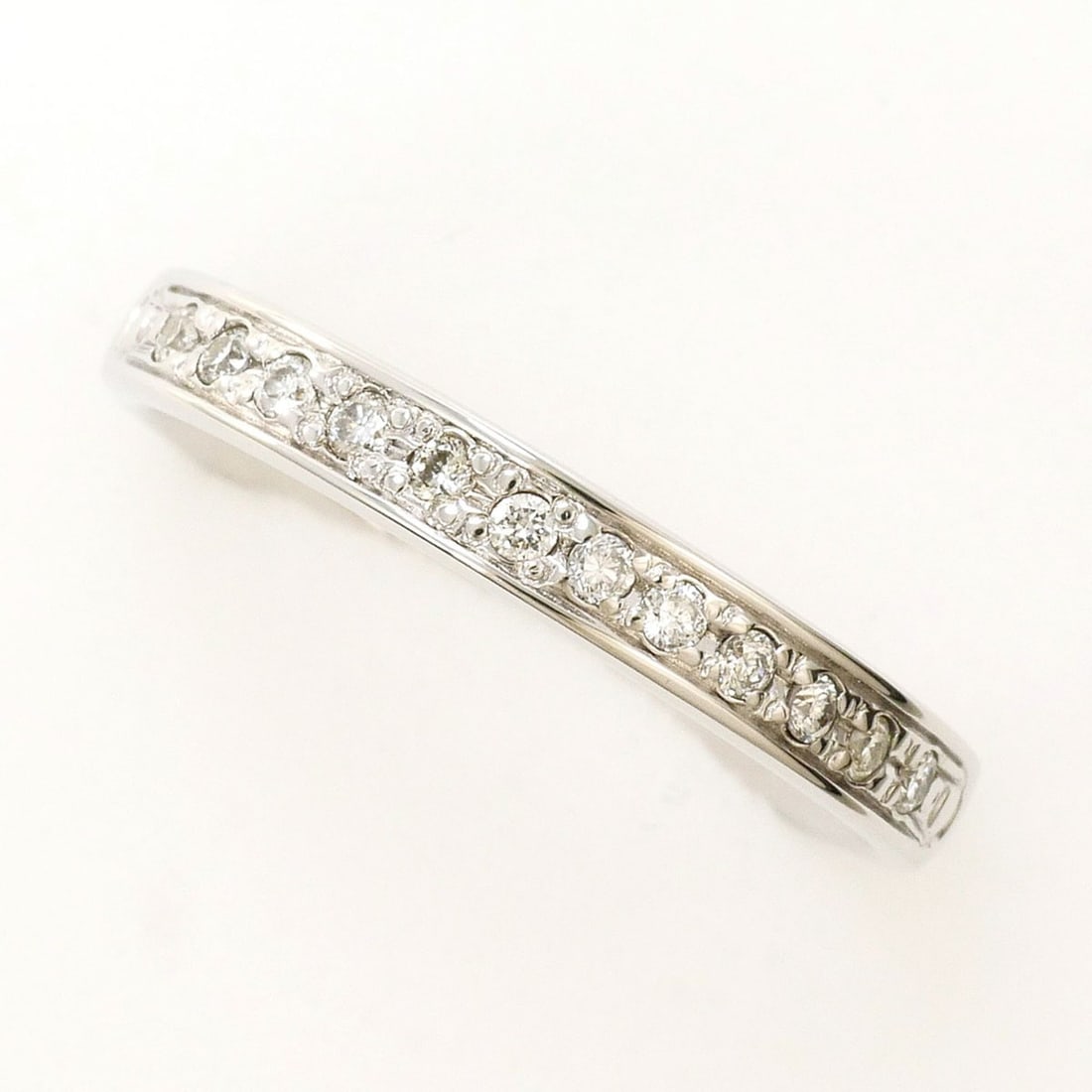 K10 10K WG White Gold Ring with 0.09ct Diamond, Total Weight 1.8g, Like New Condition.: --- Catalog ---Category: SizeWidth: 3mm / 0.12''Weight: 1.8g / 0.06oz.JP Size: 7US Size: 4Category: DesignType: Band ringColor: White goldMetal: White GoldStone: DiamondGender: WomenMaterial: White go