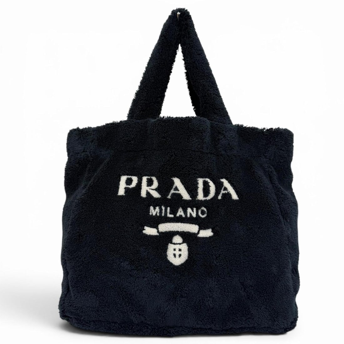 PRADA 1BG130 Terry Tote Bag with Triangle Logo Plate, Dark Navy, Made in Italy, Women's: --- Catalog ---Category: SizeSize (HxWxD): 34cm x 36cm x 16cm / 13.38'' x 14.17'' x 6.29''Category: DesignType: Tote bagColor: Dark navyGender: WomenCategory: GeneralMPN: 1BG130Brand: PradaCountry of 
