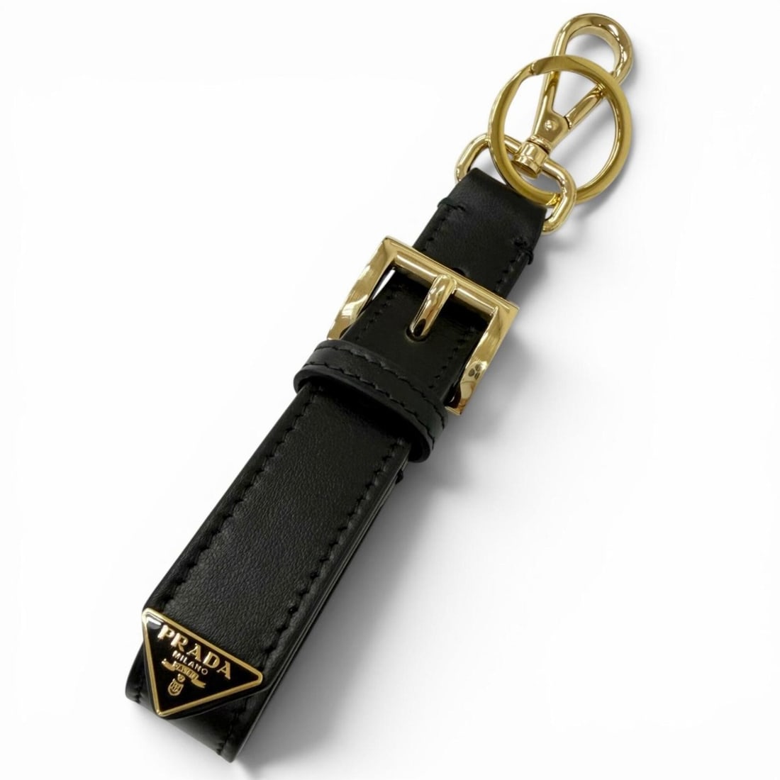 PRADA 1PP186 Leather Triangle Logo Plate Bag Charm Keychain Black Made in Italy Men's with Box: --- Catalog ---Category: DesignType: KeyringColor: BlackGender: MenMaterial: LeatherCategory: GeneralMPN: 1PP186Brand: PradaCountry of Origin: Italy--- Item List ---Section: ConditionRanking: Rank A U