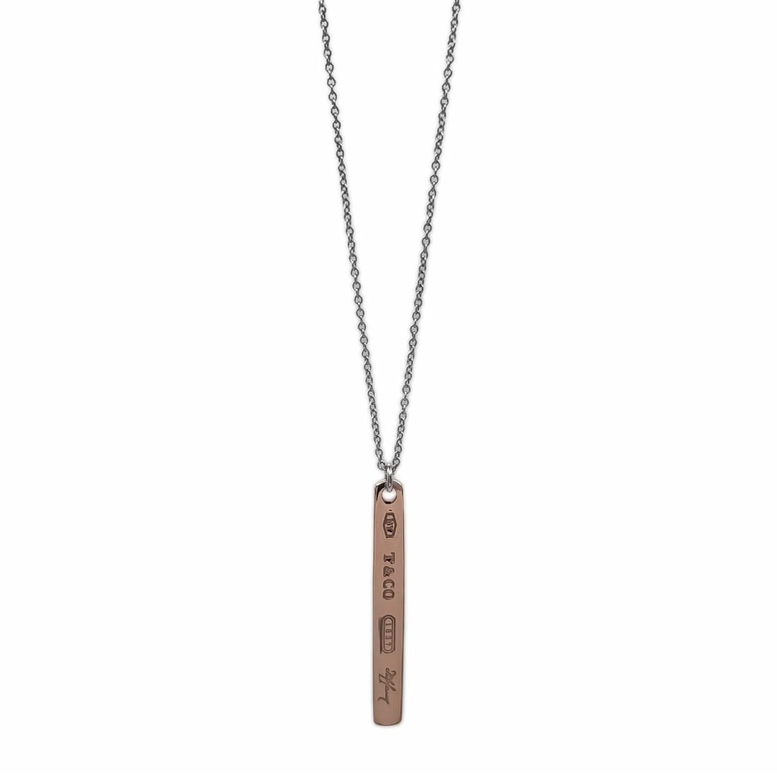 TIFFANY & Co. 1837 Narrow Bar Necklace Pendant, SV925 Rubedo Metal, Gold, Women's: --- Catalog ---Category: SizePendant Size: 30mm x 4mm / 1.18'' x 0.15''Neck Circumference: 39 cm / 15.35''Category: DesignColor: Gold, SilverGender: WomenMaterial: Silver 925Pendant Type: PendantNeckl