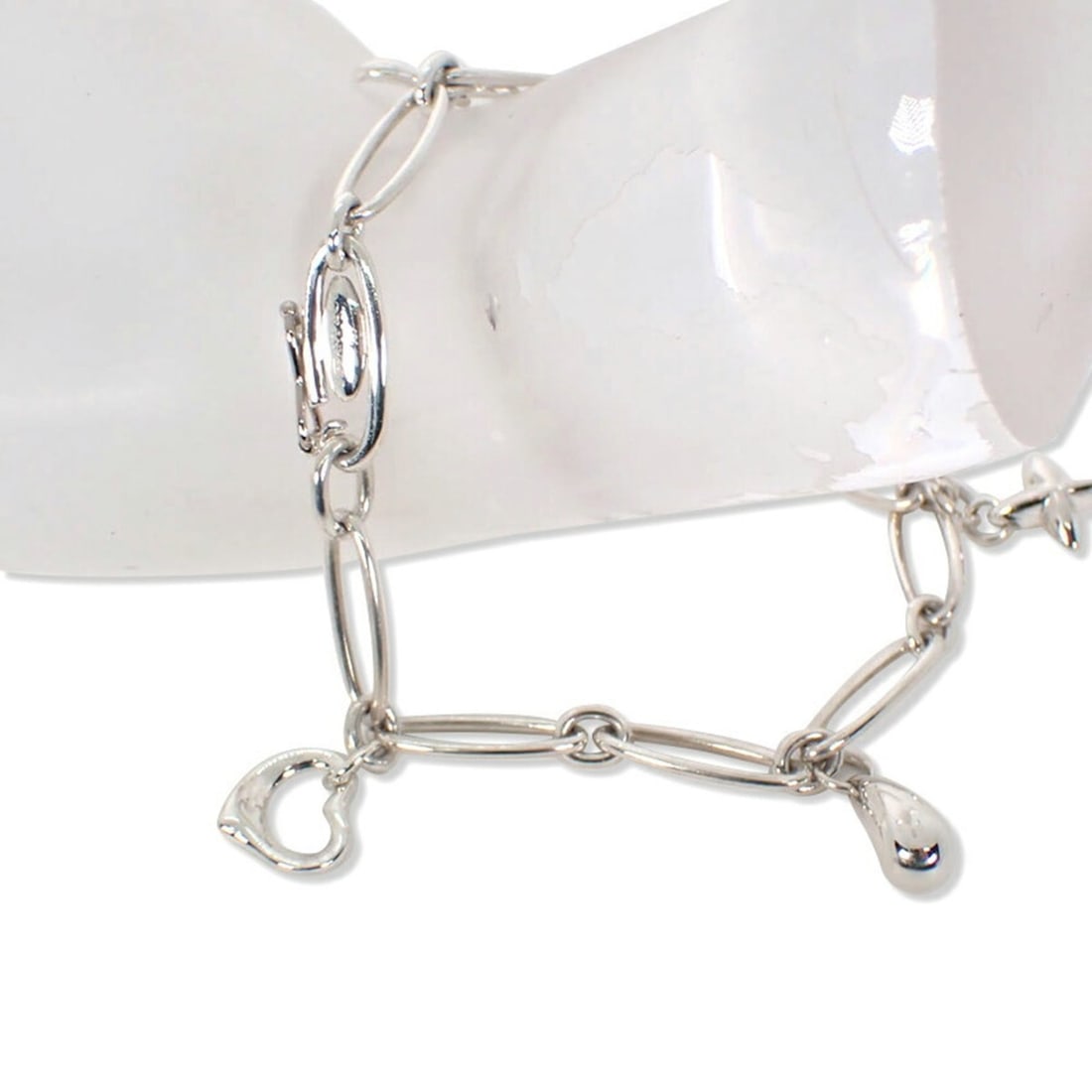 TIFFANY & Co. 925 5 Charm Bracelet: --- Catalog ---Category: SizeLength: 10cm / 3.93''Category: DesignType: Charm braceletGender: WomenMaterial: Sterling silver 925Category: GeneralBrand: Tiffany--- Item List ---Section: ConditionRankin