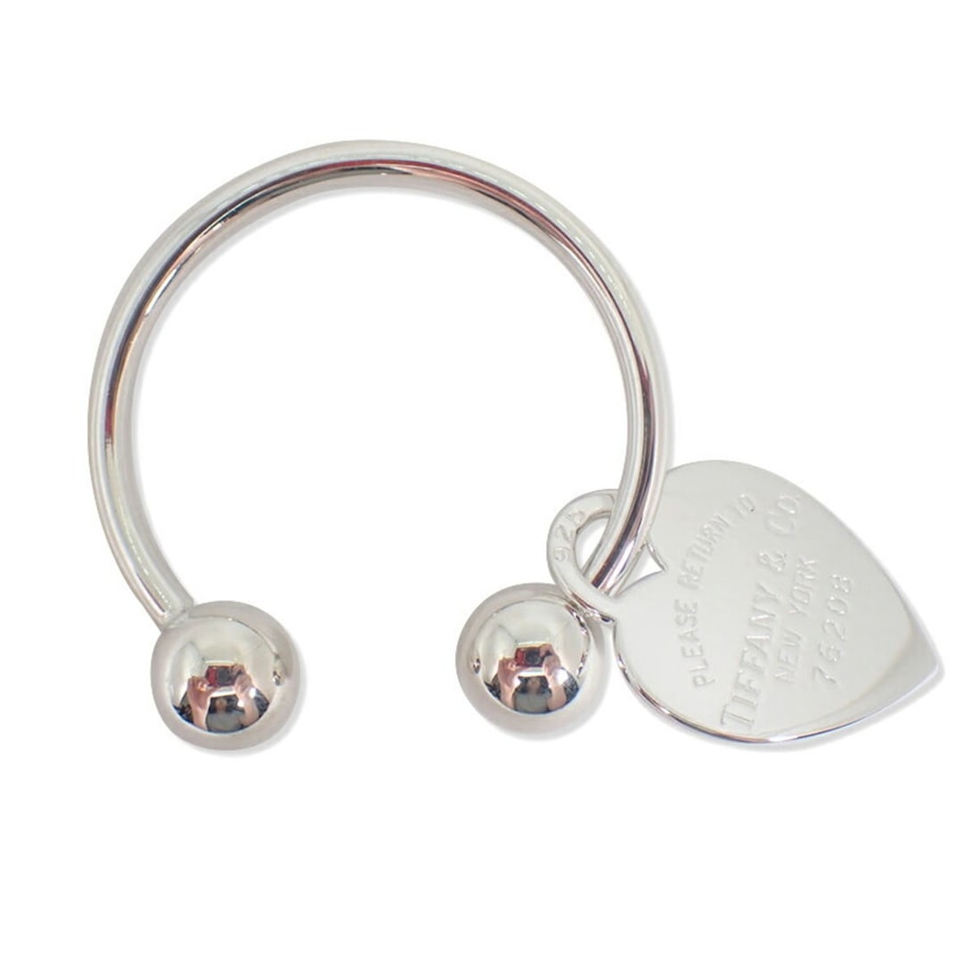 TIFFANY & Co. 925 Return to Tiffany Heart Tag Keyring: --- Catalog ---Category: DesignType: KeyringGender: Men,WomenMaterial: Sterling silver 925Category: GeneralBrand: Tiffany--- Item List ---Section: ConditionRanking: Rank SA Used - Hardly any traces of