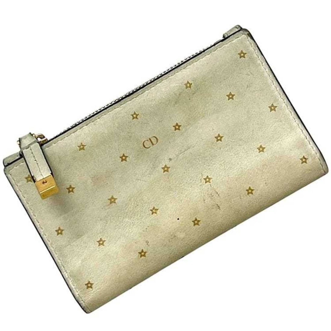 Christian Dior bi-fold wallet, beige, star pattern, leather, 03-MA-1117: --- Catalog ---Category: SizeSize (HxWxD): 8cm x 13cm x 1.5cm / 3.14'' x 5.11'' x 0.59''Category: DesignType: Wallet (bi-fold)Color: BeigeGender: WomenMaterial: Leather Category: GeneralBrand: