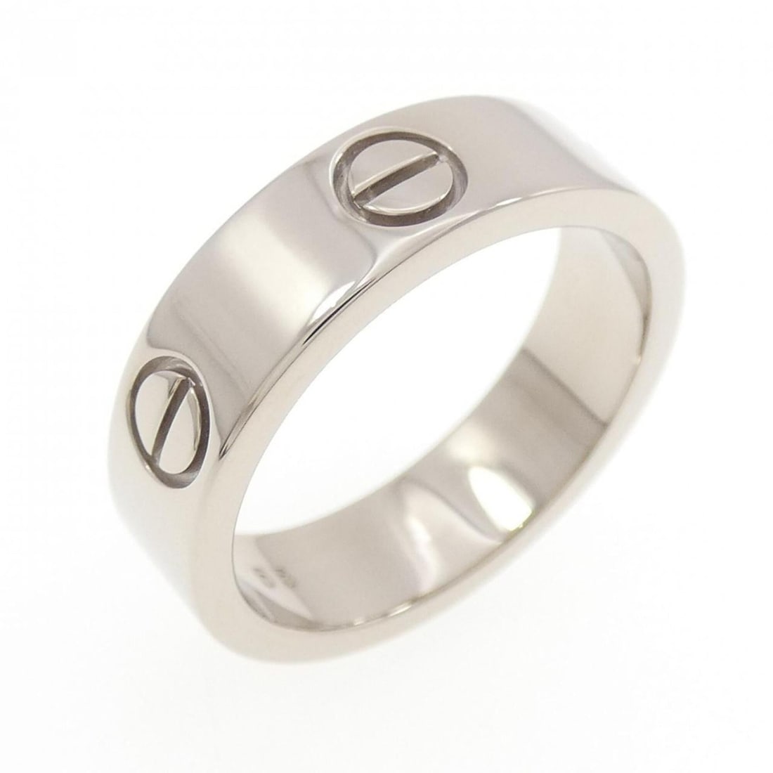 Cartier Love Ring: --- Catalog ---Category: SizeUS Size: 7.5Brand Size: 55Category: DesignType: Band ringGender: WomenMaterial: White gold (18K)Category: GeneralMPN: B4084700Brand: Cartier--- Item List ---Section: