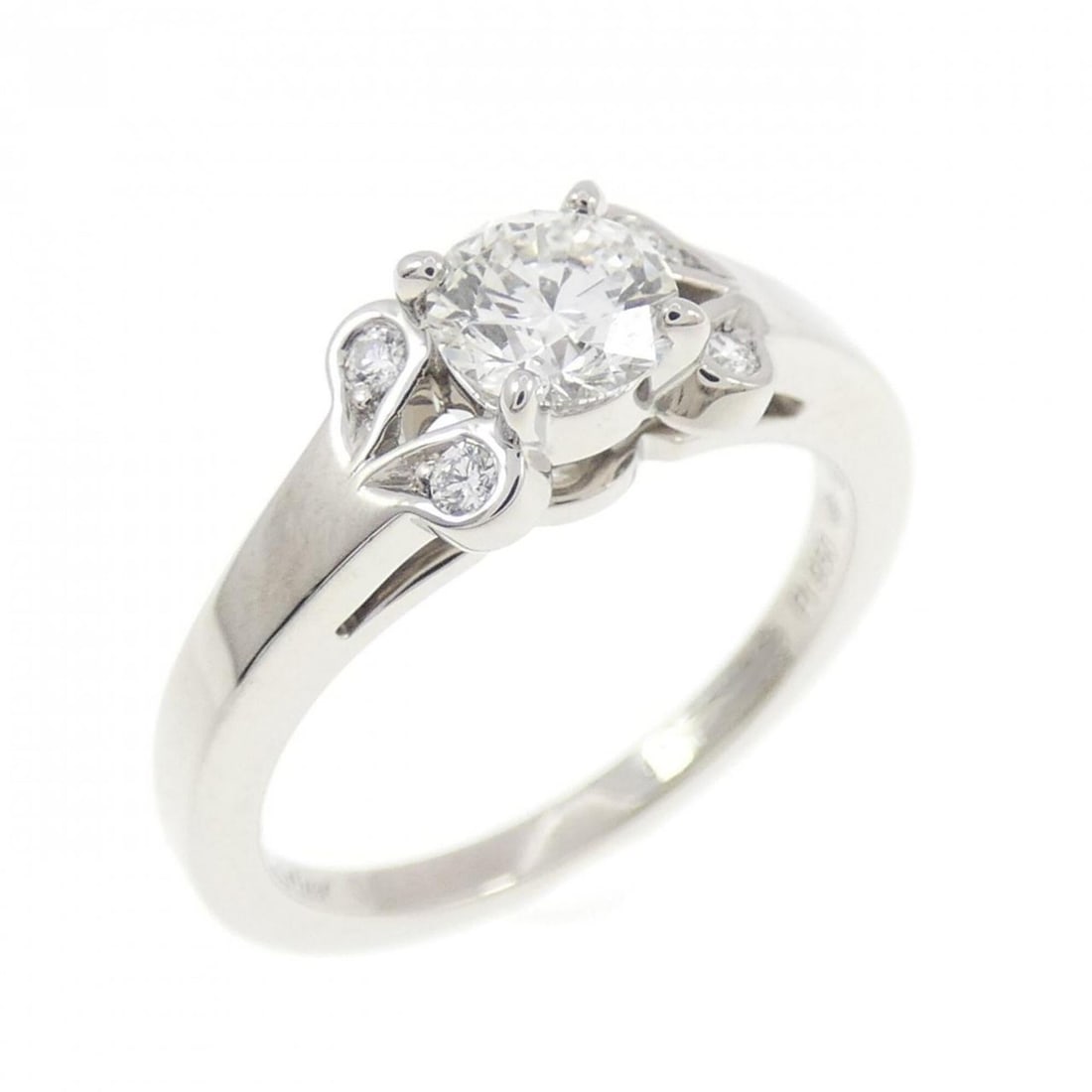 Cartier Ballerina Ring 0.35CT H VS2 3EXT: --- Catalog ---Category: SizeUS Size: 3.5Brand Size: 46Category: DesignType: Band ringColor: PlatinumStone: DiamondGender: WomenClarity: VS2Material: Platinum 950Weight (ct.): 0.35Category: