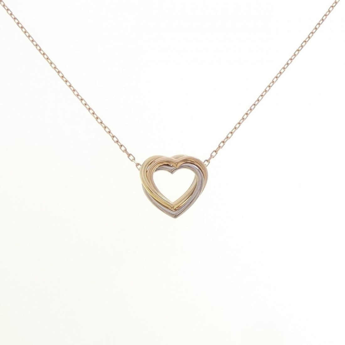 Cartier Trinity Heart Necklace: --- Catalog ---Category: SizePendant Size: 13.7mm x 14mm / 0.53'' x 0.55''Neck Circumference: 38 cm - 41 cm / 14.96'' - 16.14''Category: DesignColor: Pink gold, White gold, Yellow goldGender: