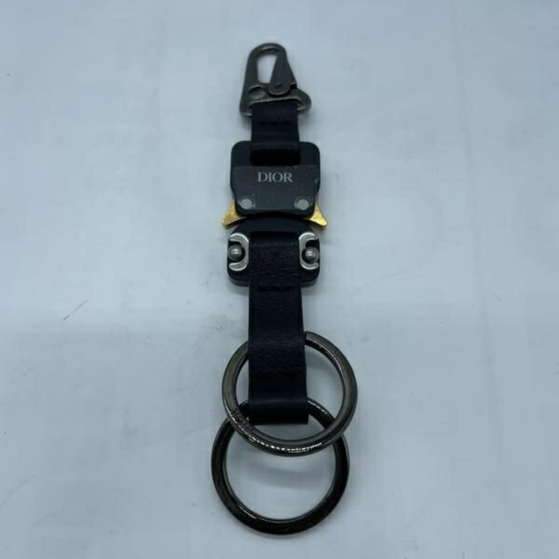 Christian Dior Keyring Keychain Black: --- Catalog ---Category: SizeSize (HxWxD): 16cm x 3cm / 6.29'' x 1.18''Category: DesignType: KeyringColor: BlackGender: Women,MenCategory: GeneralBrand: Christian Dior--- Item List ---Section: Conditi
