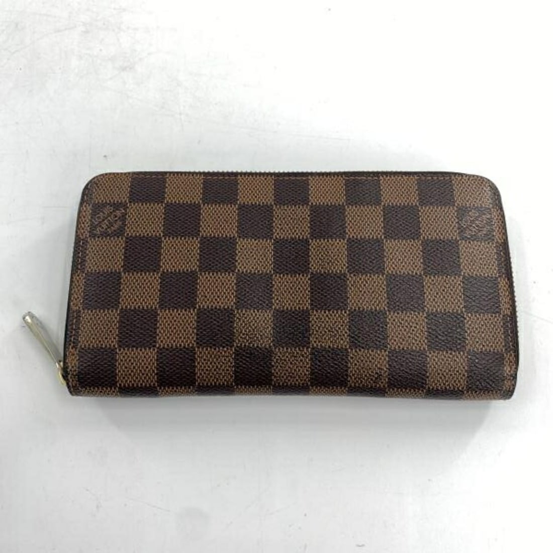 LOUIS VUITTON Zippy Wallet Long N60015 Damier Brown Louis Vuitton: --- Catalog ---Category: SizeSize (HxWxD): 10cm x 19.5cm x 2.5cm / 3.93'' x 7.67'' x 0.98''Category: DesignType: Long wallet (bi-fold)Color: BrownGender: Men,WomenCategory: GeneralLine: DamierBrand: