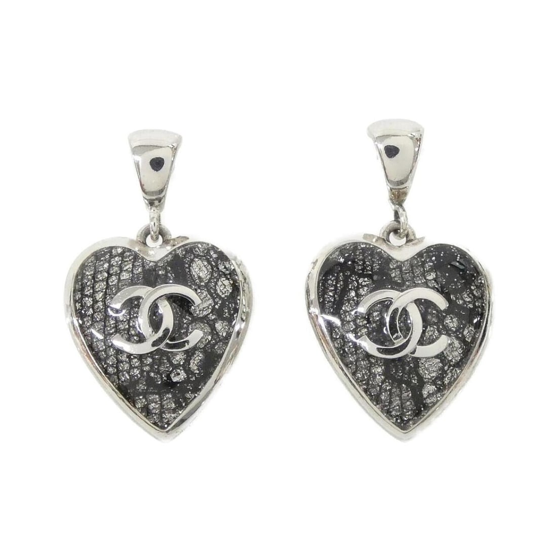 Chanel ABE704 Earrings: --- Catalog ---Category: SizeSize (HxWxD): 33.00mm x 20.00mm / 1.30'' x 0.79''Category: DesignType: Stud earringsColor: Black, SilverGender: WomenCategory: GeneralMPN: ABE704Brand: Chanel--- Item
