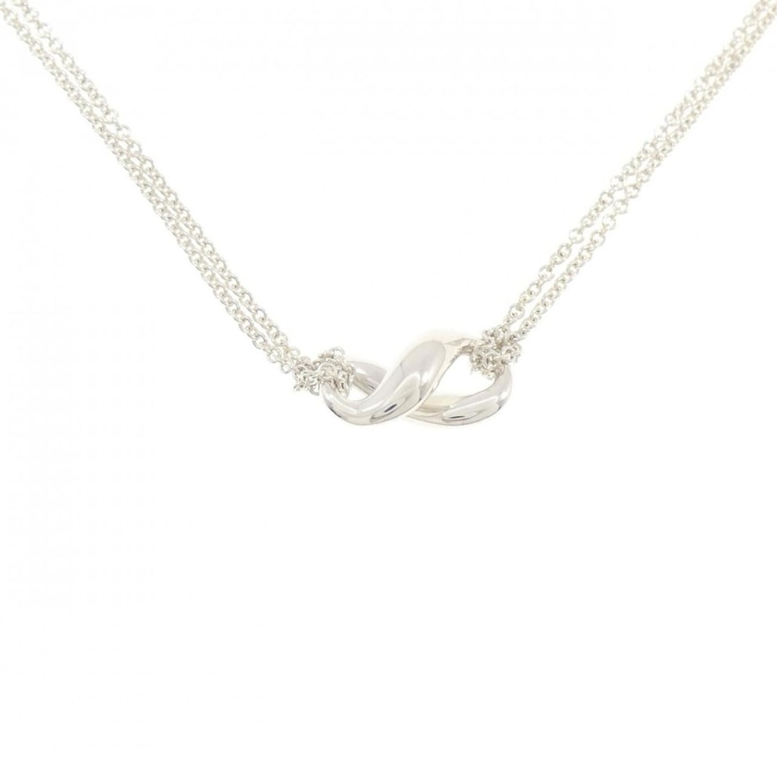 Tiffany & Co. Figure Eight Necklace: --- Catalog ---Category: SizePendant Size: 9.3mm x 18.7mm / 0.36'' x 0.73''Neck Circumference: 40 cm / 15.74''Category: DesignGender: WomenMaterial: Silver 925Pendant Type: PendantNecklace Type:
