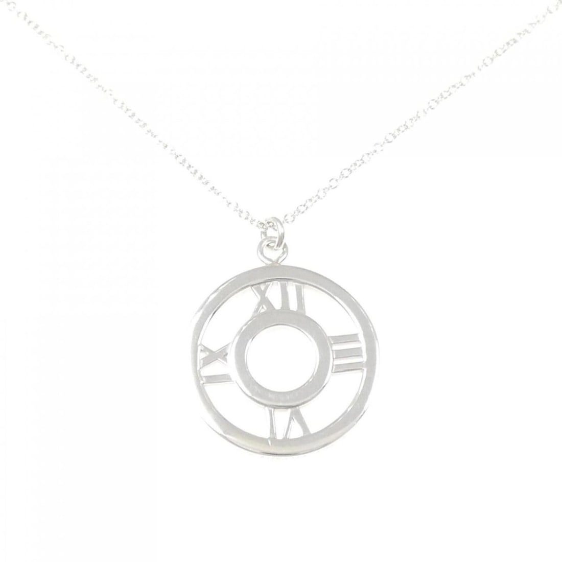 Tiffany & Co. Atlas Open Medallion Medium Necklace: --- Catalog ---Category: SizeWidth: 0.7mm / 0.03''Weight: 3.8g / 0.13oz.Pendant Size: 22.4mm x 18mm / 0.88'' x 0.7''Neck Circumference: 43 cm / 16.92''Category: DesignGender: WomenMaterial: Silver