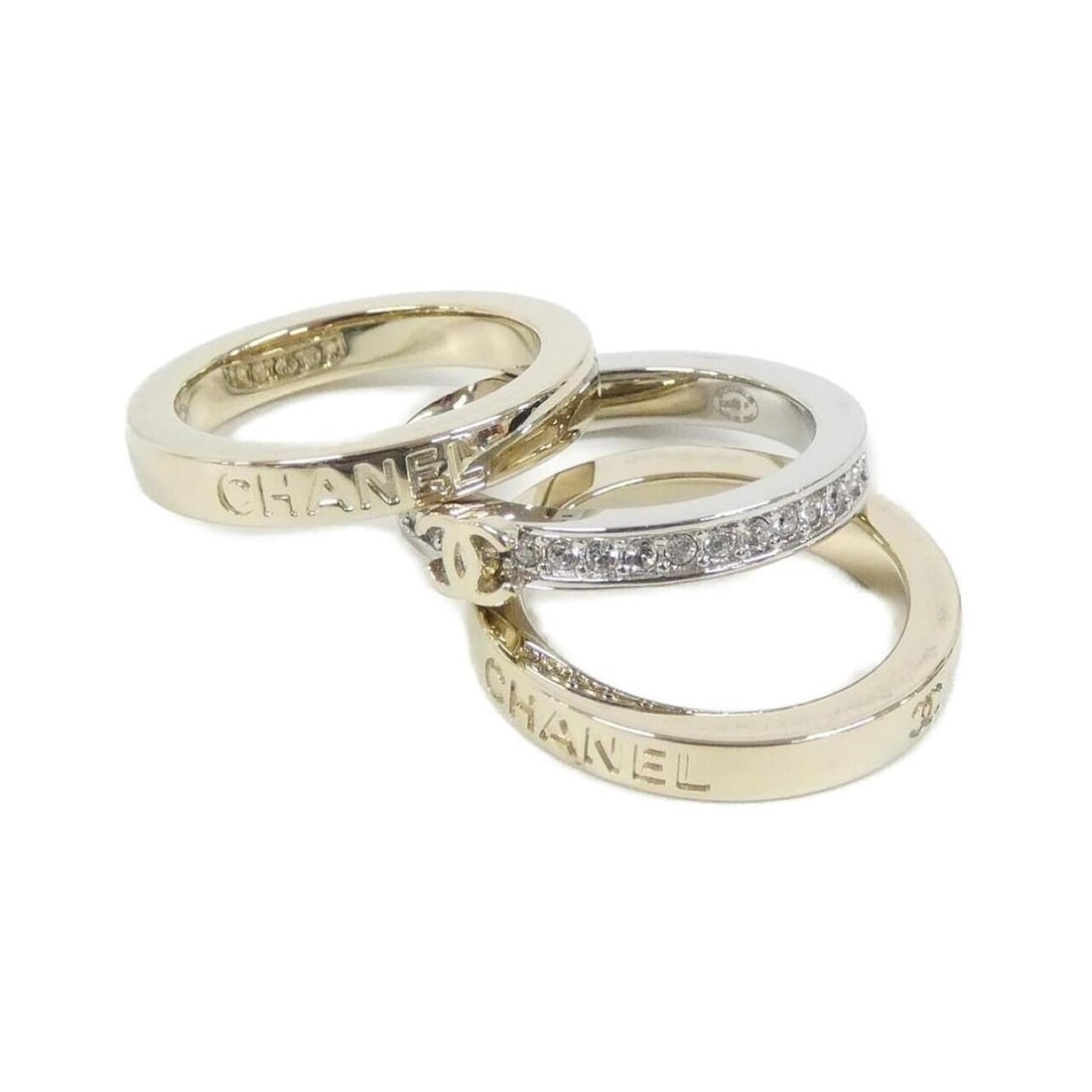 Chanel ABH091 Ring: --- Catalog ---Category: SizeWidth: 3mm / 0.12''JP Size: 14US Size: 7Category: DesignType: Band ringColor: Gold, SilverStone: CrystalGender: WomenCategory: GeneralBrand: Chanel--- Item List