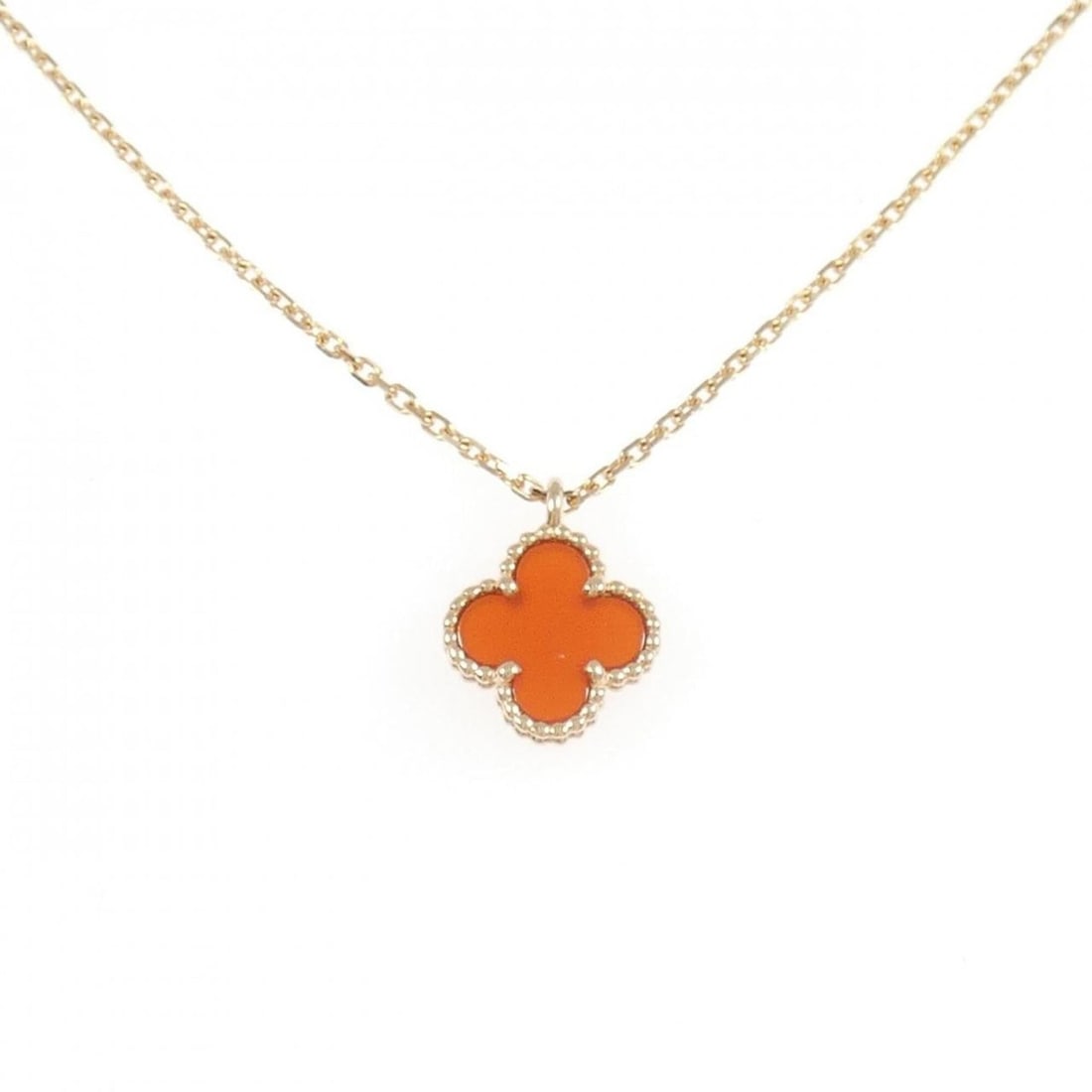 Van Cleef & Arpels Sweet Alhambra Necklace: --- Catalog ---Category: SizePendant Size: 11.4mm x 9.1mm / 0.44'' x 0.35''Neck Circumference: 38 cm - 40 cm / 14.96'' - 15.74''Category: DesignColor: Pink goldStone: CarnelianGender: WomenMaterial:
