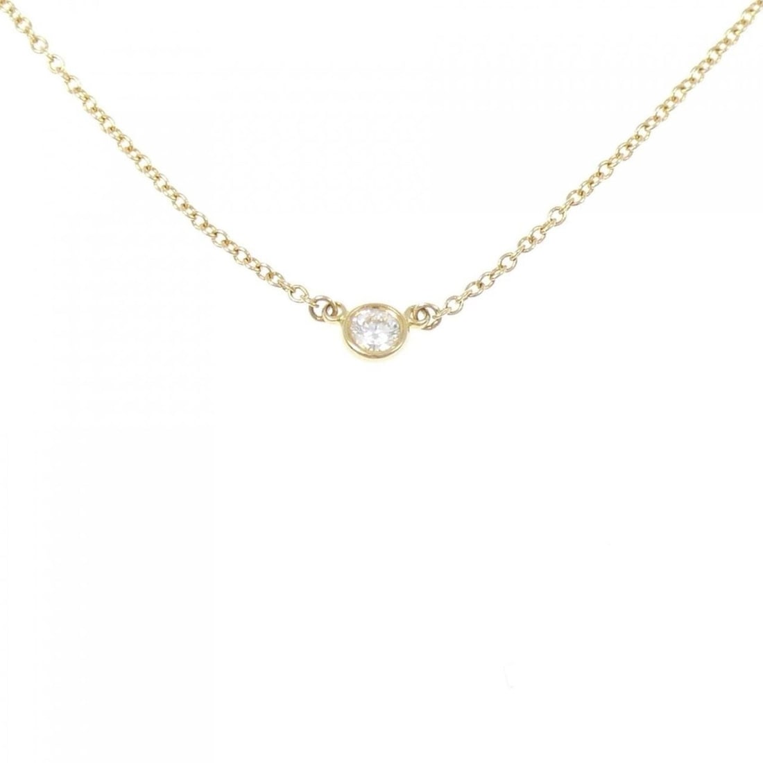 Tiffany & Co. By the Yard Necklace: --- Catalog ---Category: SizePendant Size: 3.9mm x 3.9mm / 0.15'' x 0.15''Neck Circumference: 41 cm / 16.14''Category: DesignColor: Yellow goldStone: DiamondGender: WomenMaterial: Yellow gold
