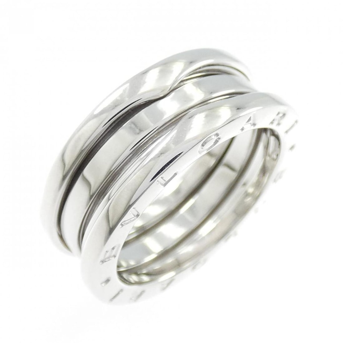 Bvlgari Bulgari B.zero1 Ring: --- Catalog ---Category: SizeUS Size: 7.5Brand Size: 55Category: DesignType: Band ringColor: White goldGender: Women,MenMaterial: White gold (18K)Category: GeneralBrand: Bvlgari--- Item List ---Sectio
