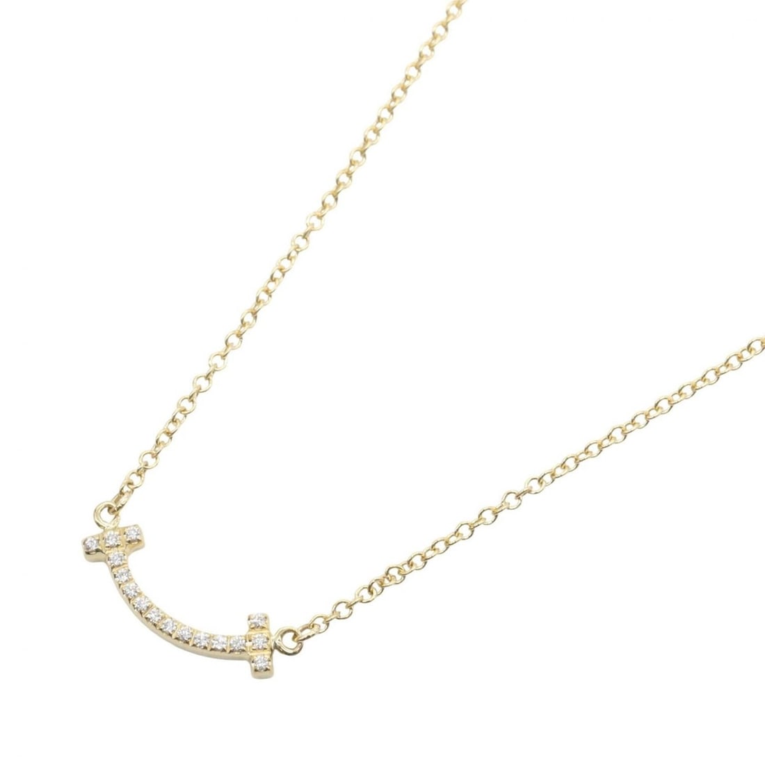 Tiffany & Co. T Smile Mini Diamond Necklace, 18K (Yellow Gold), Diamond, Women's, Gold Tone, Clear: --- Catalog ---Category: SizePendant Size: 3mm x 13mm / 0.11'' x 0.51''Neck Circumference: 40.5 cm - 46 cm / 15.94'' - 18.11''Category: DesignColor: Clear, GoldStone: DiamondGender: WomenMaterial: Yel