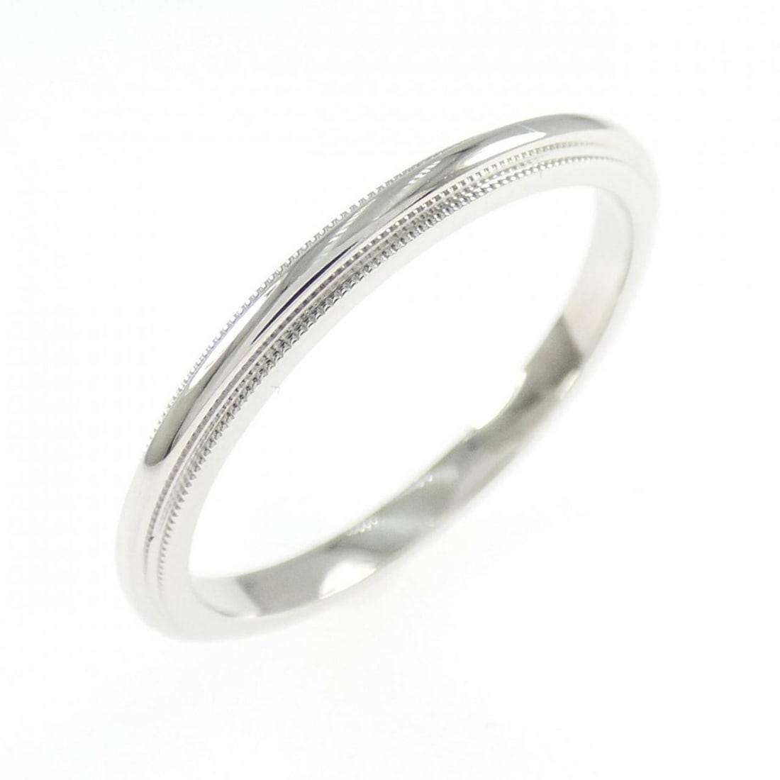 Tiffany & Co. Milgrain Ring: --- Catalog ---Category: SizeJP Size: 16.5US Size: 8Category: DesignType: Band ringColor: PlatinumGender: Women,MenMaterial: Platinum 950Category: GeneralBrand: Tiffany--- Item List ---Section: