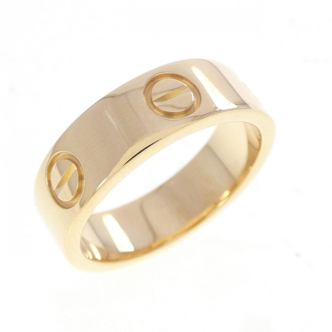 Cartier Love Ring: --- Catalog ---Category: SizeUS Size: 6Brand Size: 51Category: DesignType: Band ringGender: WomenMaterial: Yellow gold (18K)Category: GeneralMPN: B4084600Brand: Cartier--- Item List ---Section: