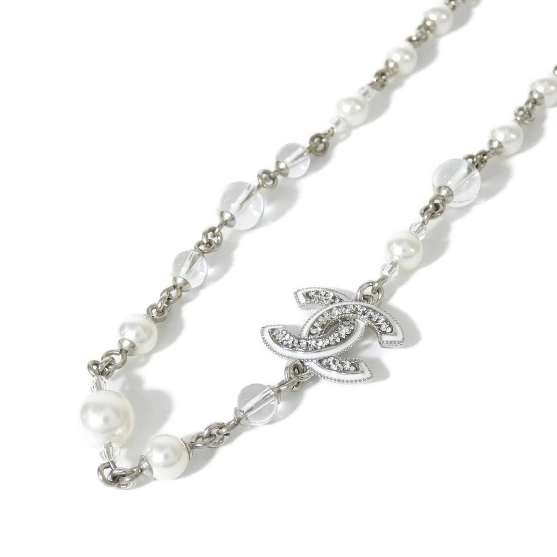 Chanel ABE883 Necklace: --- Catalog ---Category: SizePendant Size: 15mm x 20mm / 0.59'' x 0.78''Neck Circumference: 32 cm - 37 cm / 12.59'' - 14.56''Category: DesignColor: Clear, Silver, WhiteGender: Men,WomenNecklace Type: