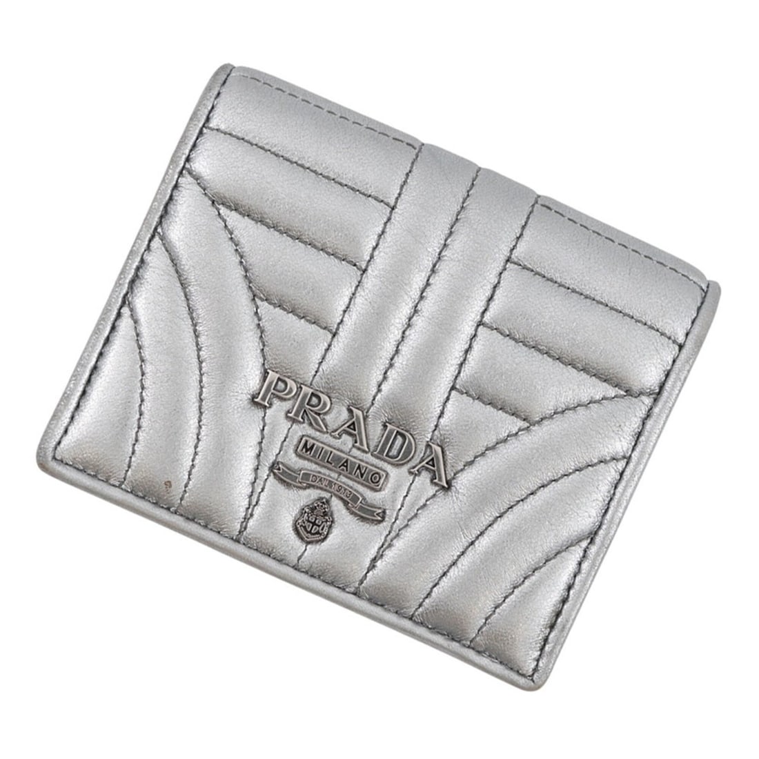 Prada Bi-fold Wallet Compact 1MV204 PRADA WALLET: --- Catalog ---Category: SizeSize (HxWxD): 9cm x 11.5cm / 3.54'' x 4.52''Category: DesignType: Wallet (bi-fold)Color: SilverGender: WomenMaterial: Leather Category: GeneralMPN: 1MV204Brand: PradaCount