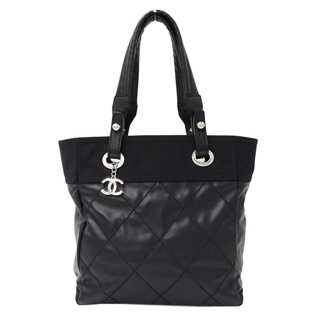 Chanel handbag, Paris Biarritz style, women's brand tote bag, coated canvas, black, silver hardware.: --- Catalog ---Category: SizeSize (HxWxD): 27cm x 32cm x 11cm / 10.62'' x 12.59'' x 4.33''Category: DesignType: Handbag, Tote bagColor: BlackGender: WomenMaterial: Coated canvas Hardware Color: Silver