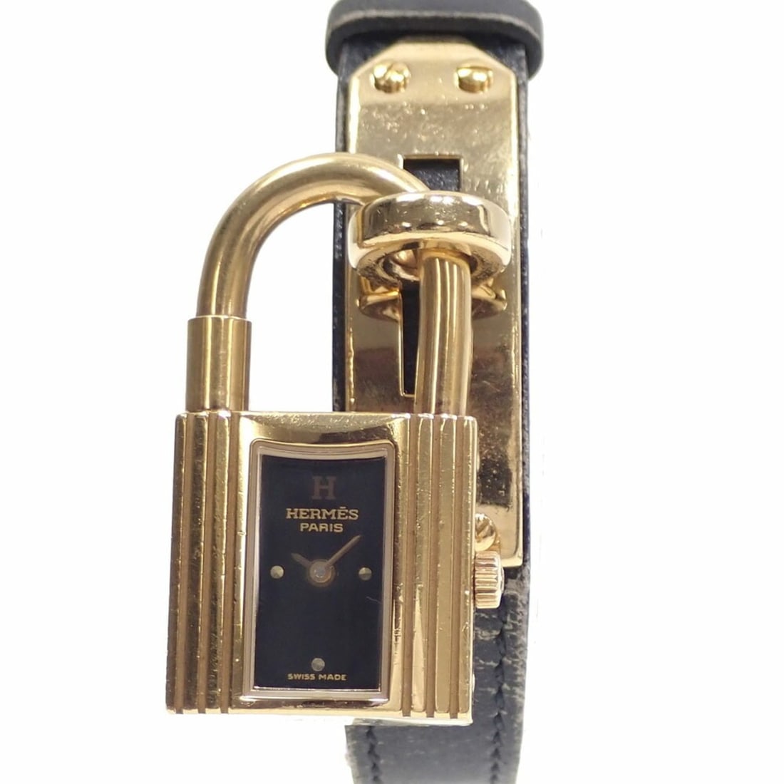Hermes Kelly Watch, Ladies' Quartz GP Leather Strap, KT1.210, Battery-Powered, ?B Stamp, Circa: --- Catalog ---Category: SizeWrist Size: 16cm / 6.29''Case Diameter: 20mm / 0.79''Category: DesignType: WristwatchGender: WomenColor (Dial): BlackMaterial (Band): LeatherMaterial (Case): Gold platedCa