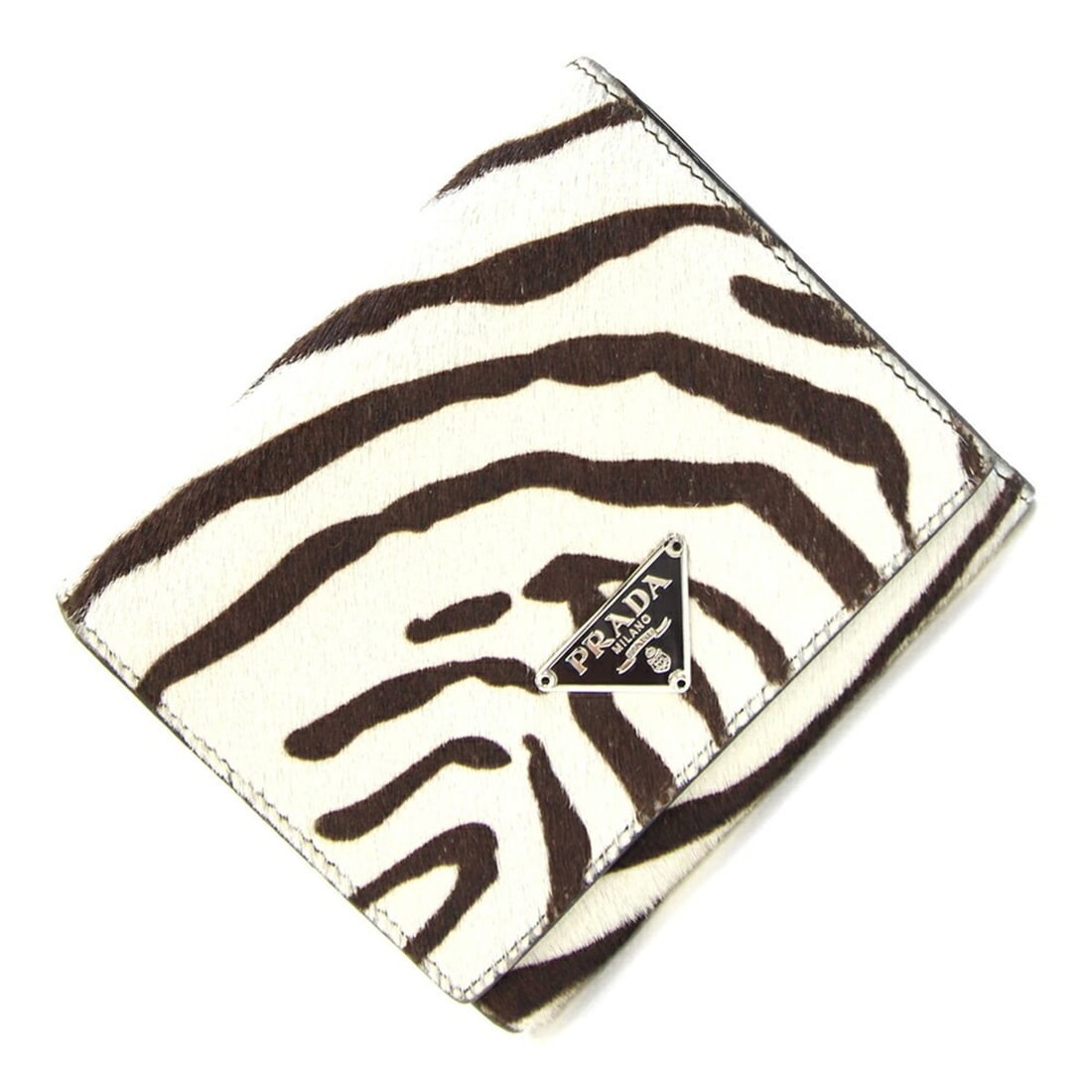 Prada Tri-fold Wallet, White & Black, Calfskin Leather, Compact Zebra Print, Women's PRADA: --- Catalog ---Category: SizeSize (HxWxD): 9.5cm x 11.2cm x 2cm / 3.74'' x 4.4'' x 0.78''Category: DesignType: Wallet (tri-fold)Color: Black, WhiteGender: WomenMaterial: Leather Leather/Fur Type: Hara