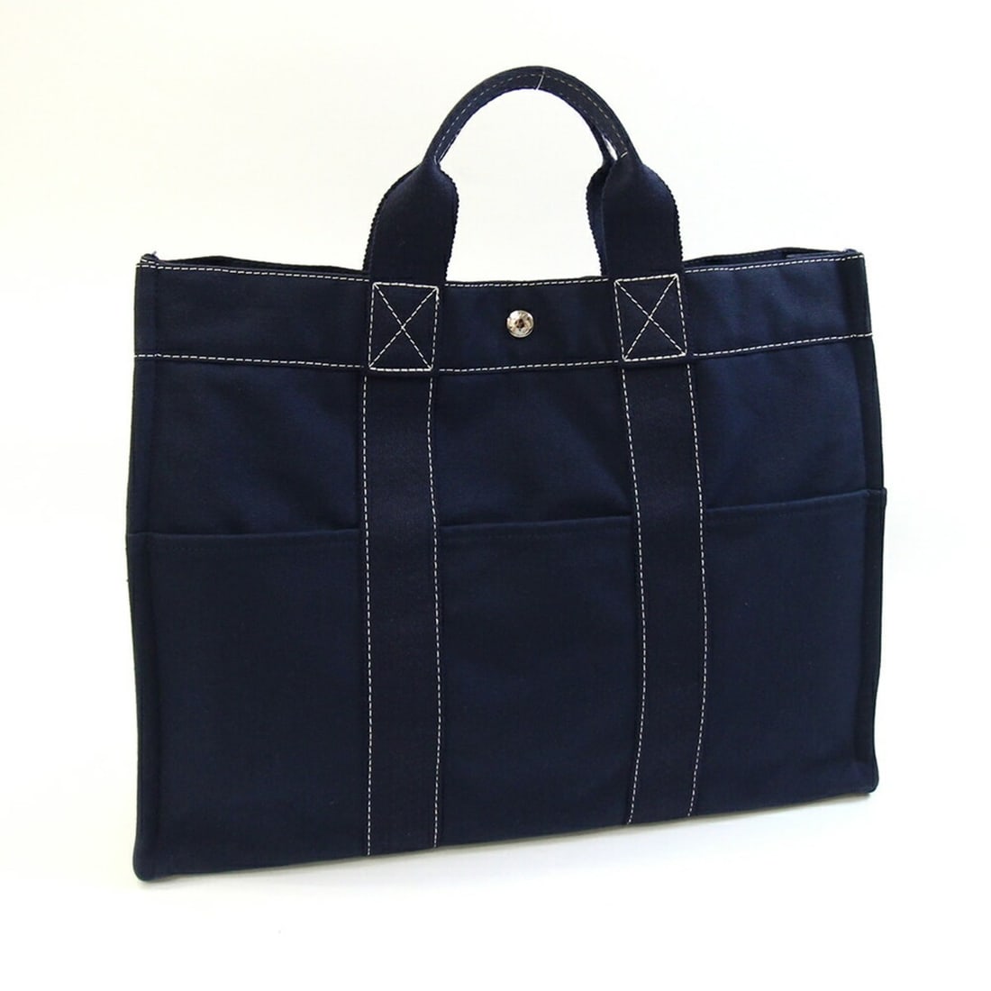Hermes Deauville MM Handbag 101105M Navy 100% Cotton Hand Tote Stitch Women's Men's HERMES: --- Catalog ---Category: SizeSize (HxWxD): 31cm x 43cm x 9.5cm / 12.2'' x 16.92'' x 3.74''Category: DesignType: HandbagColor: NavyGender: Men,WomenMaterial: Cotton 100%Category: GeneralBrand: HermesCo