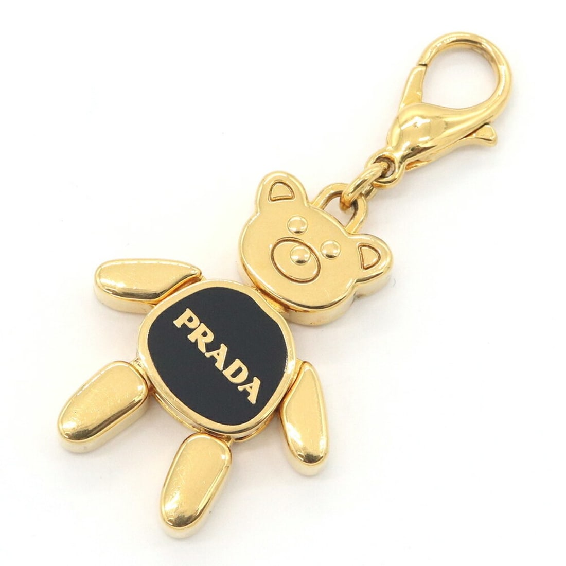 Prada Charm Teddy 1AJB11 Black Gold Metal Accessory Bag Keychain Bear Women's PRADA: --- Catalog ---Category: SizeWeight: 12.1g / 0.42oz.Size (HxWxD): 53.00mm x 26.00mm / 2.09'' x 1.02''Category: DesignType: Handbag charmColor: Black, Gold, NeroGender: WomenMaterial: MetalCategory: Ge