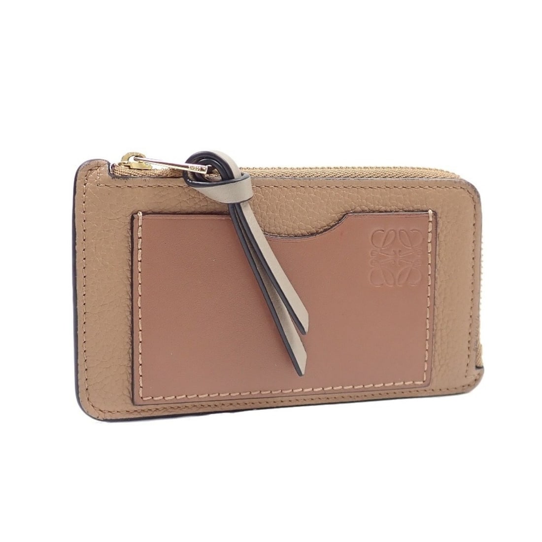 Loewe Coin Card Holder for Men, Camel Leather, C660Z40X04, Anagram Case: --- Catalog ---Category: DesignType: Card caseColor: CamelGender: Men,WomenMaterial: Leather Category: GeneralMPN: C660Z40X04Brand: LoeweCategory: Physical PropertiesSize (HxWxD): 7.5cm x 12.5cm x 5mm