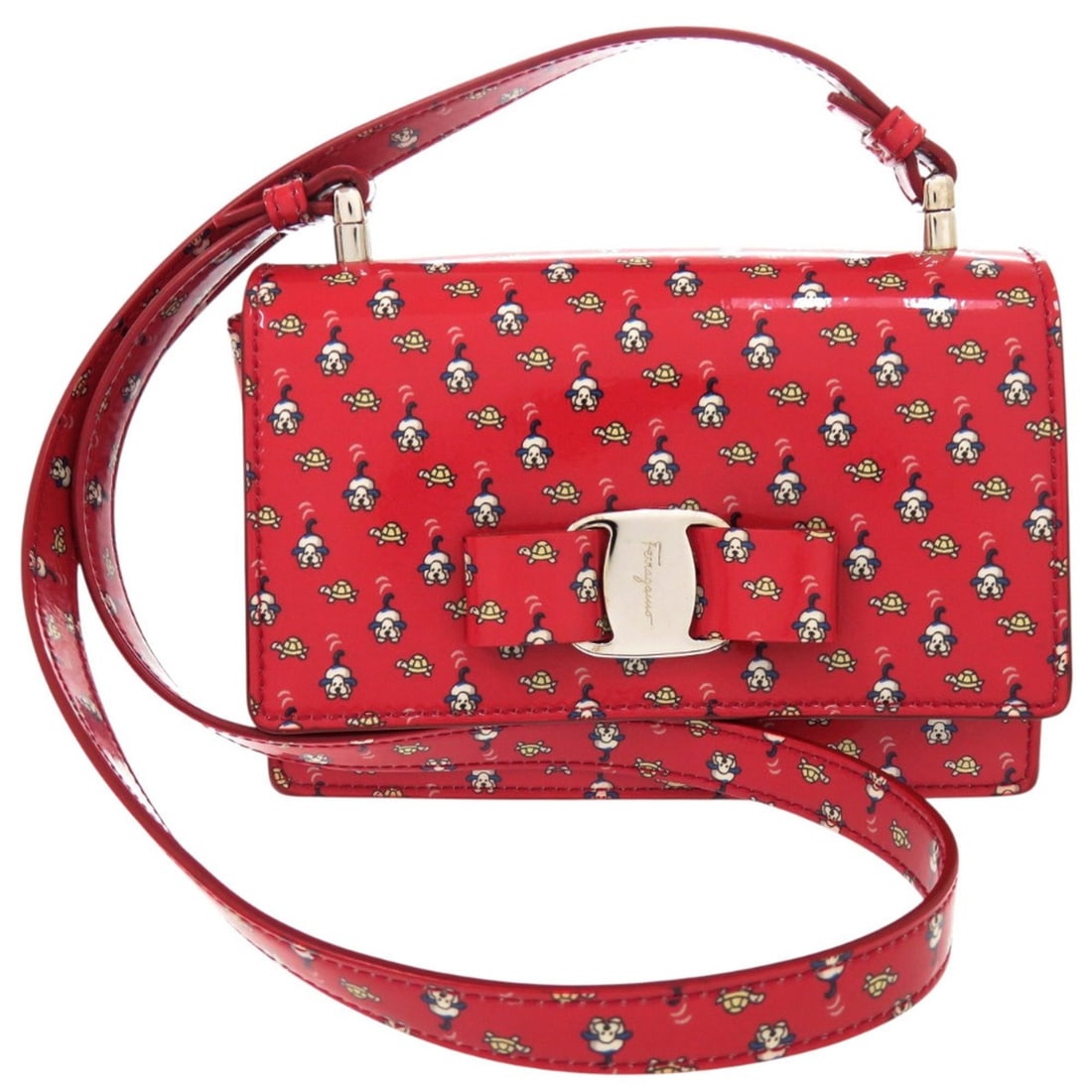 Salvatore Ferragamo Vara Ribbon Dog Turtle RE-21G079 Enamel Red Shoulder Bag 0396: --- Catalog ---Category: SizeSize (HxWxD): 11cm x 17cm x 6cm / 4.33'' x 6.69'' x 2.36''Category: DesignType: Shoulder bagColor: Red colorGender: WomenMaterial: Leather Leather/Fur Type: Enamel Leather
