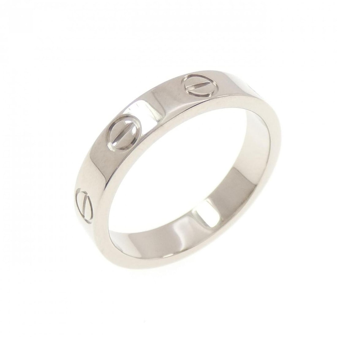 Cartier Mini Love Ring: --- Catalog ---Category: SizeUS Size: 5Brand Size: 49Category: DesignType: Band ringGender: WomenMaterial: White gold (18K)Category: GeneralMPN: B4085100Brand: Cartier--- Item List ---Section: