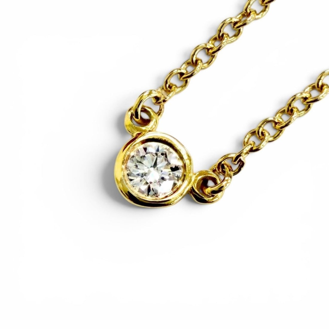TIFFANY&Co. Tiffany By the Yard 1P Diamond Necklace 750 YG Diameter approx. 3.32mm Approx. 0.05ct: --- Catalog ---Category: SizePendant Size: 3.32mm / 0.13''Neck Circumference: 40.5 cm / 15.94''Category: DesignStone: DiamondGender: WomenMaterial: Yellow gold (18K)Necklace Type: NecklaceCategory: Ge
