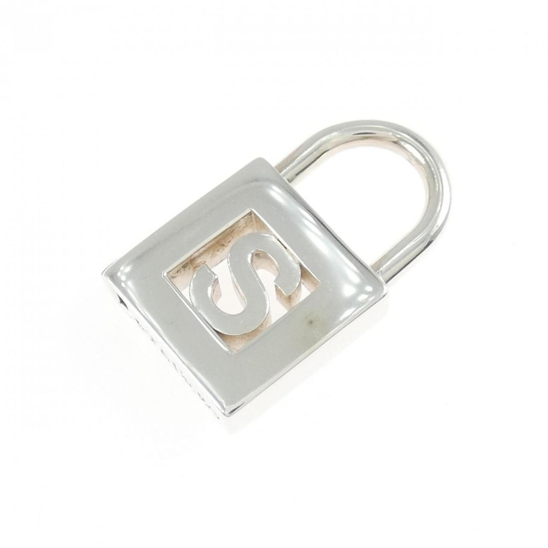 Tiffany & Co. Lock Charm Pendant: --- Catalog ---Category: SizePendant Size: 22.6mm x 13.5mm / 0.88'' x 0.53''Category: DesignGender: WomenMaterial: Silver 925Necklace Type: PendantCategory: GeneralBrand: Tiffany--- Item List