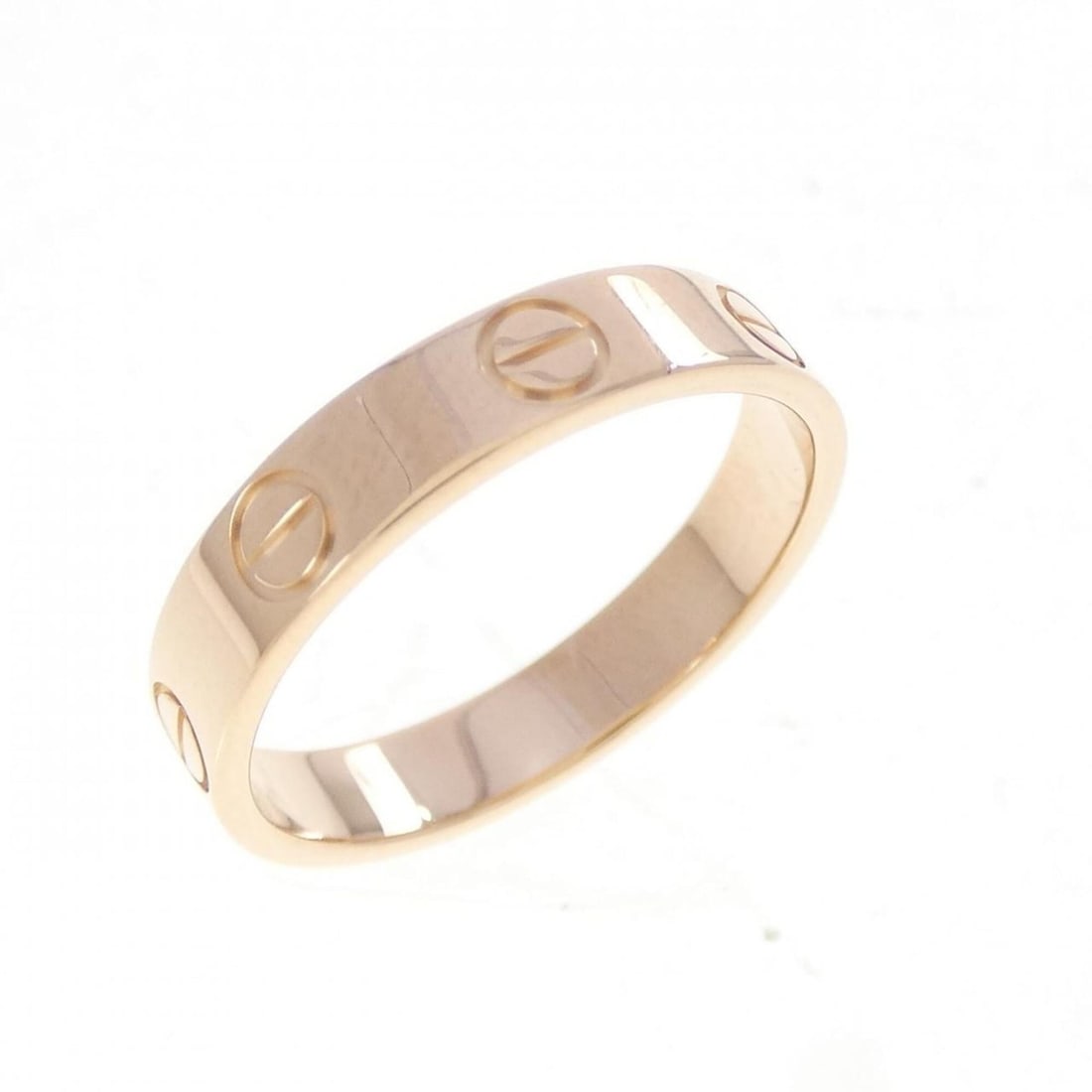 Cartier Mini Love Ring: --- Catalog ---Category: SizeUS Size: 6Brand Size: 51Category: DesignType: Band ringGender: WomenMaterial: Pink gold (18K)Category: GeneralMPN: B4085000Brand: Cartier--- Item List ---Section: