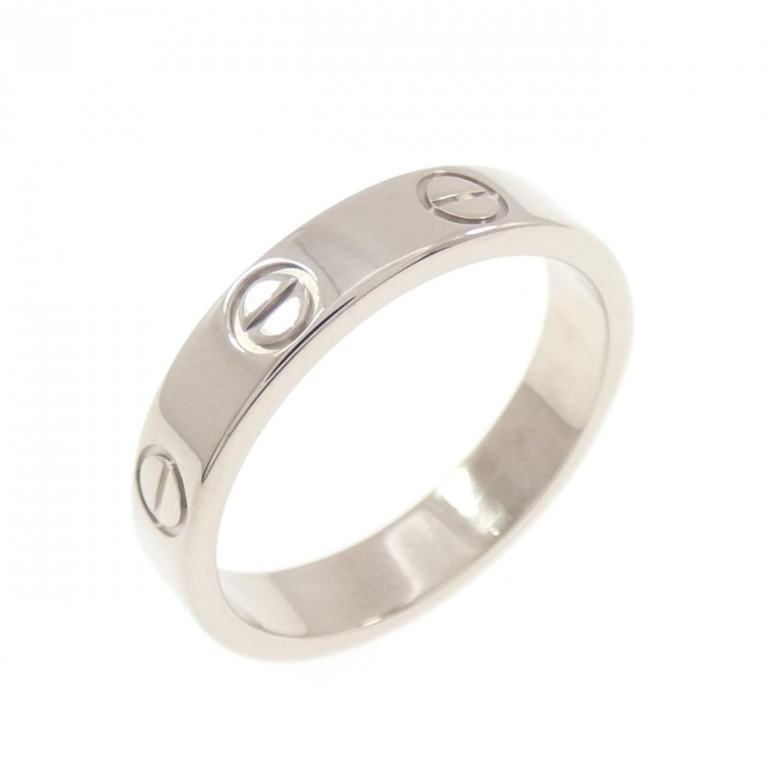 Cartier Mini Love Ring: --- Catalog ---Category: SizeUS Size: 5Brand Size: 49Category: DesignType: Band ringGender: WomenMaterial: White gold (18K)Category: GeneralMPN: B4085100Brand: Cartier--- Item List ---Section: