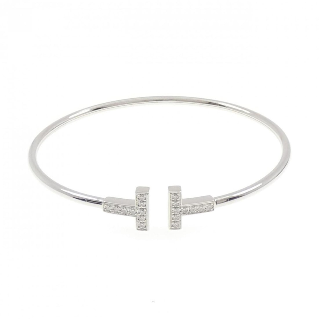 Tiffany T Wire Bangle: --- Catalog ---Category: SizeLength: 17.5cm / 6.88''Category: DesignType: BangleStone: DiamondGender: WomenMaterial: White gold (18K)Category: GeneralBrand: Tiffany--- Item List ---Section: