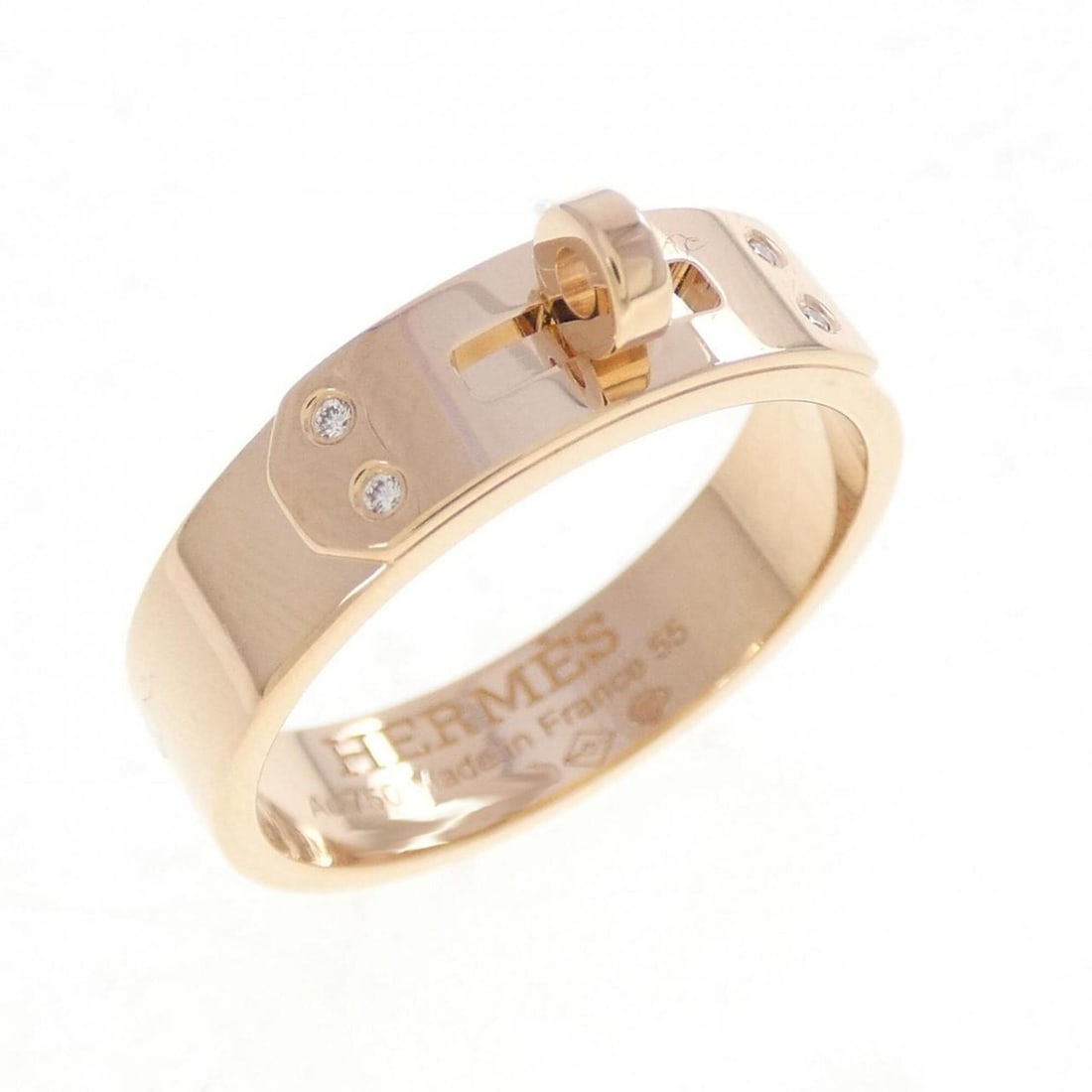 Hermes Kelly Ring: --- Catalog ---Category: SizeUS Size: 7.5Brand Size: 55Category: DesignType: Band ringStone: DiamondGender: Men,WomenMaterial: Pink gold (18K)Category: GeneralMPN: H109041BBrand: Hermes--- Item List