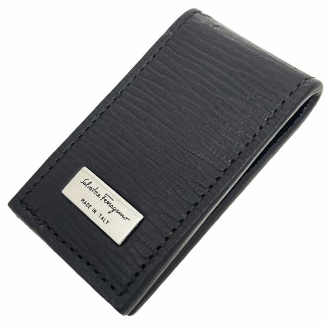 Salvatore Ferragamo Money Clip Plate Bill Leather Dark Brown GJ 6670 KK-16614: --- Catalog ---Category: SizeSize (HxWxD): 7cm x 4cm x 1.2cm / 2.75'' x 1.57'' x 0.47''Category: DesignType: Money clipColor: Dark brownGender: Women,MenMaterial: Leather Category: GeneralBrand: Salva
