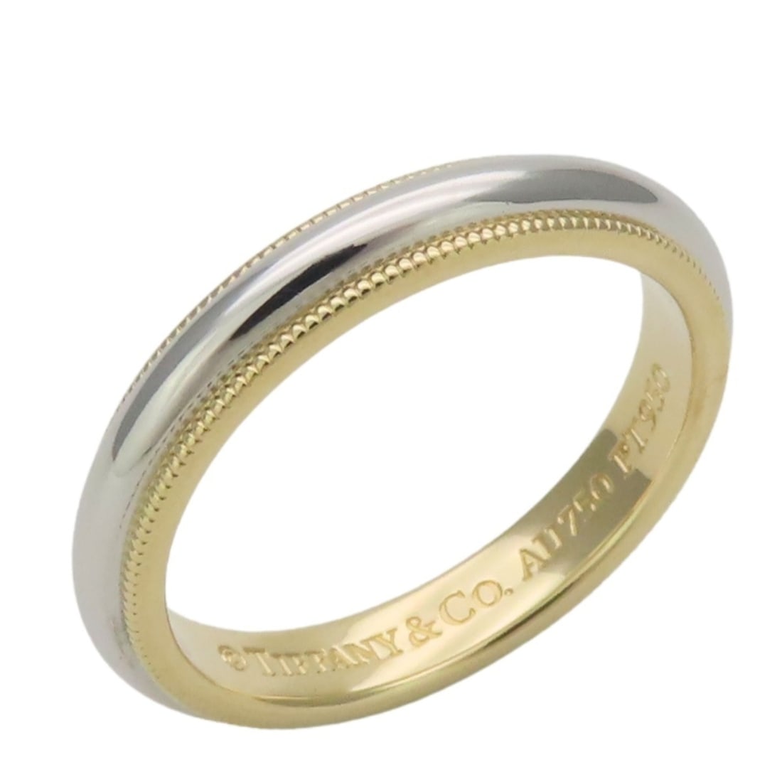 Tiffany & Co. ring, milgrain design, 18K yellow gold and platinum (Pt950) combination, for women: --- Catalog ---Category: SizeJP Size: 13US Size: 6.5Category: DesignType: Band ringColor: Platinum, Yellow goldGender: Men,WomenMaterial: Platinum 950, Yellow gold (18K)Category: GeneralBrand: Tiffany