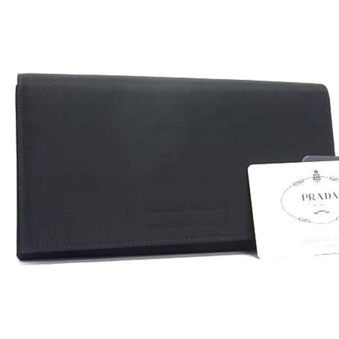 PRADA Triangle Wallet M608 Black Tessuto Nylon Men's and Women's Bi-fold with Mark: --- Catalog ---Category: SizeSize (HxWxD): 10.3cm x 18.5cm x 1.4cm / 4.05'' x 7.28'' x 0.55''Category: DesignType: Long wallet (bi-fold)Color: BlackGender: Men,WomenMaterial: Tessuto Category: General