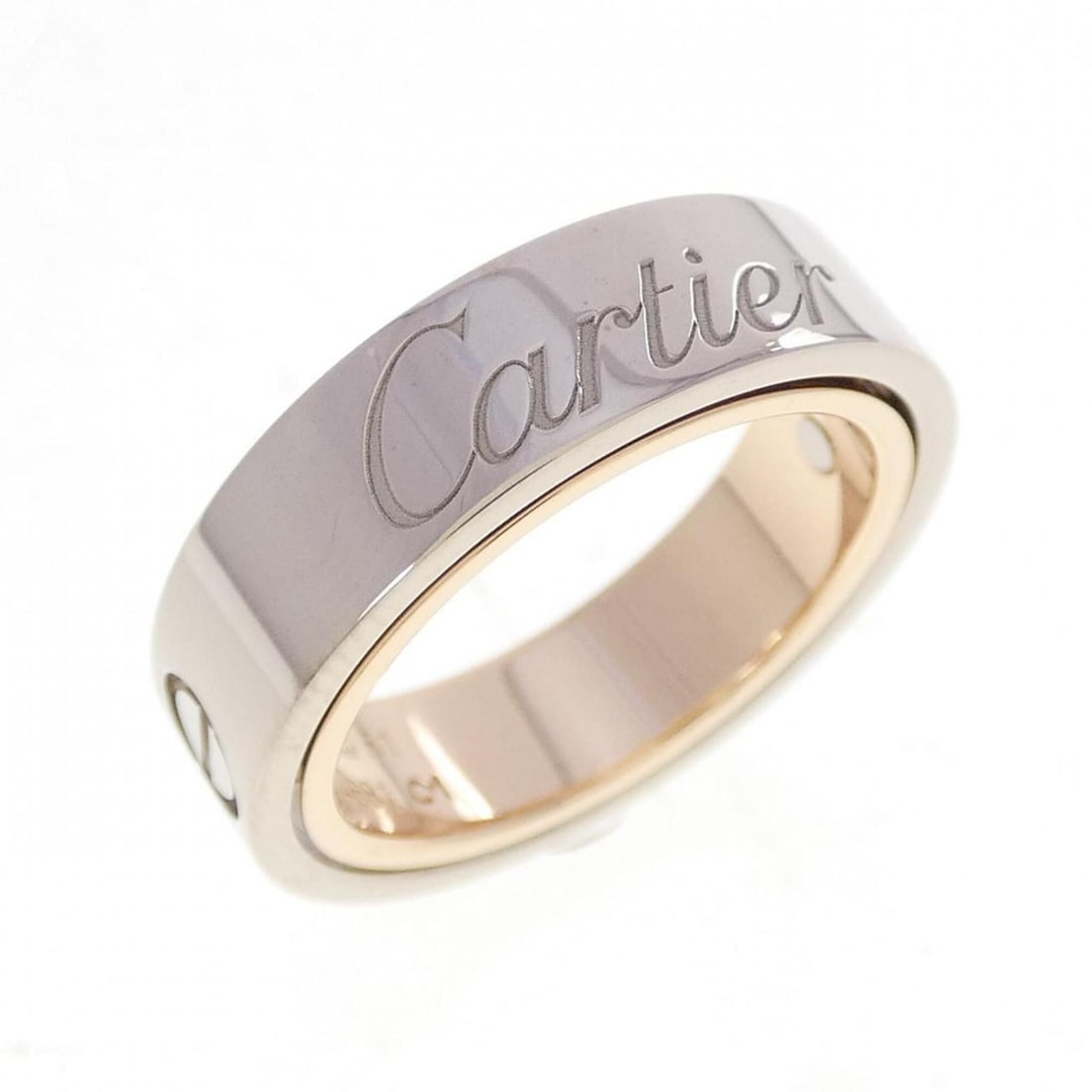 Cartier Love Secret Ring, 2005 Christmas Limited Edition Ring: --- Catalog ---Category: SizeWidth: 5.9mm / 0.23''Weight: 10.7g / 0.37oz.JP Size: 11US Size: 6Category: DesignType: Band ringGender: WomenMaterial: Pink gold (18K), White gold (18K)Category: GeneralBr