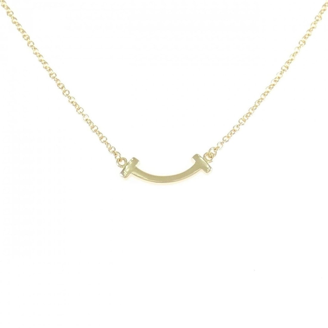 Tiffany T Smile Mini Necklace: --- Catalog ---Category: SizeWidth: 1mm / 0.04''Weight: 2.3g / 0.08oz.Pendant Size: 3.5mm x 13.7mm / 0.13'' x 0.53''Neck Circumference: 40 cm - 46 cm / 15.74'' - 18.11''Category: DesignGender: