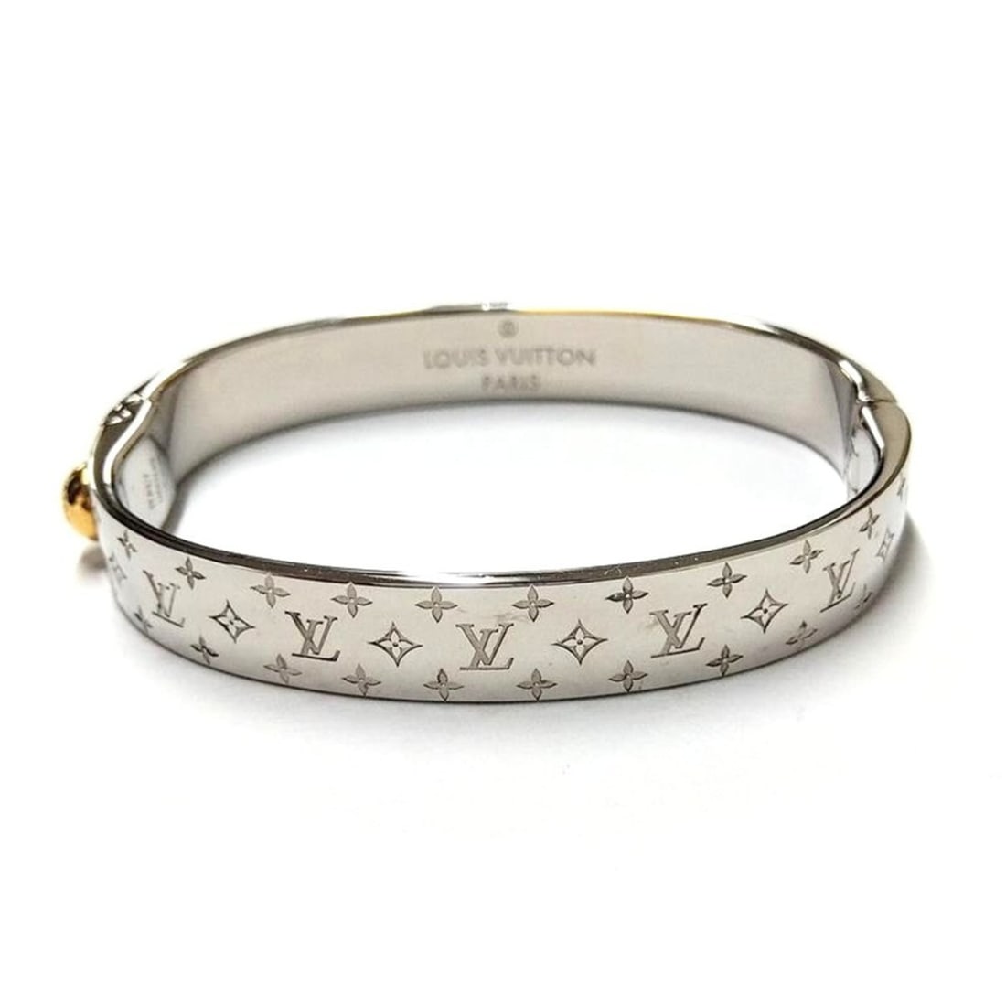Louis Vuitton Nanogram Cuff Bangle S GPg Silver M00249: --- Catalog ---Category: SizeSize: SWidth: 9mm / 0.35''Length: 15cm / 5.9''Weight: 27.7g / 0.97oz.Category: DesignType: Cuff braceletColor: SilverFinish: Gold platedGender: WomenCategory: GeneralBrand