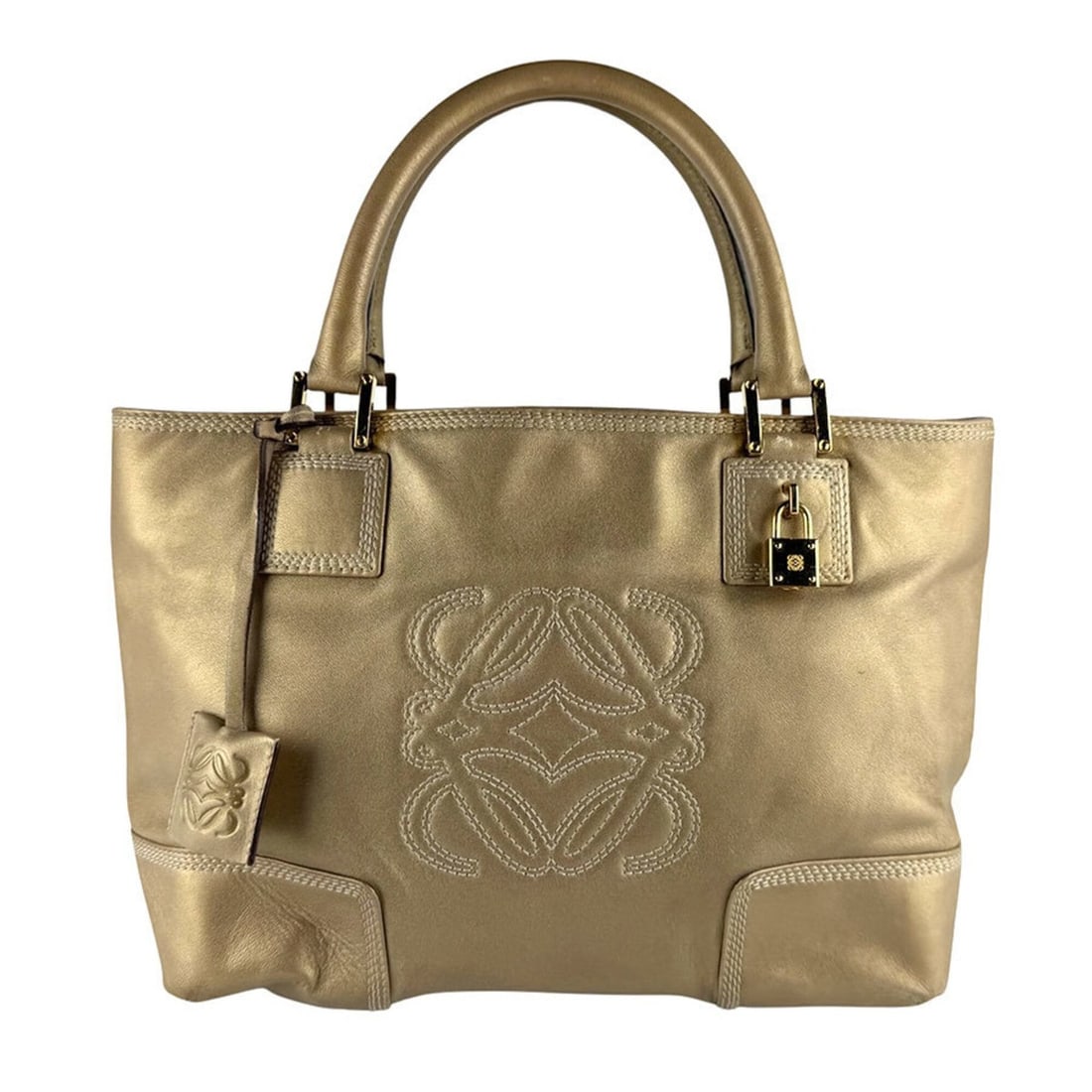 Loewe Amazona Fusta Leather Handbag, Gold, Women's, z9959: --- Catalog ---Category: SizeSize (HxWxD): 20cm x 29cm x 13cm / 7.87'' x 11.41'' x 5.11''Category: DesignType: HandbagColor: GoldGender: WomenMaterial: Leather Category: GeneralBrand: Loewe--- Item Li