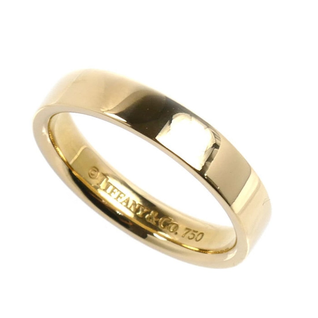 TIFFANY&Co. Tiffany 18K Yellow Gold Flat Band Ring (5.6g) - Men's & Women's: --- Catalog ---Category: SizeUS Size: 7.5Brand Size: 55Category: DesignType: Band ringGender: Men,WomenMaterial: Yellow gold (18K)Category: GeneralBrand: TiffanyCountry of Origin: USA--- Item List ---